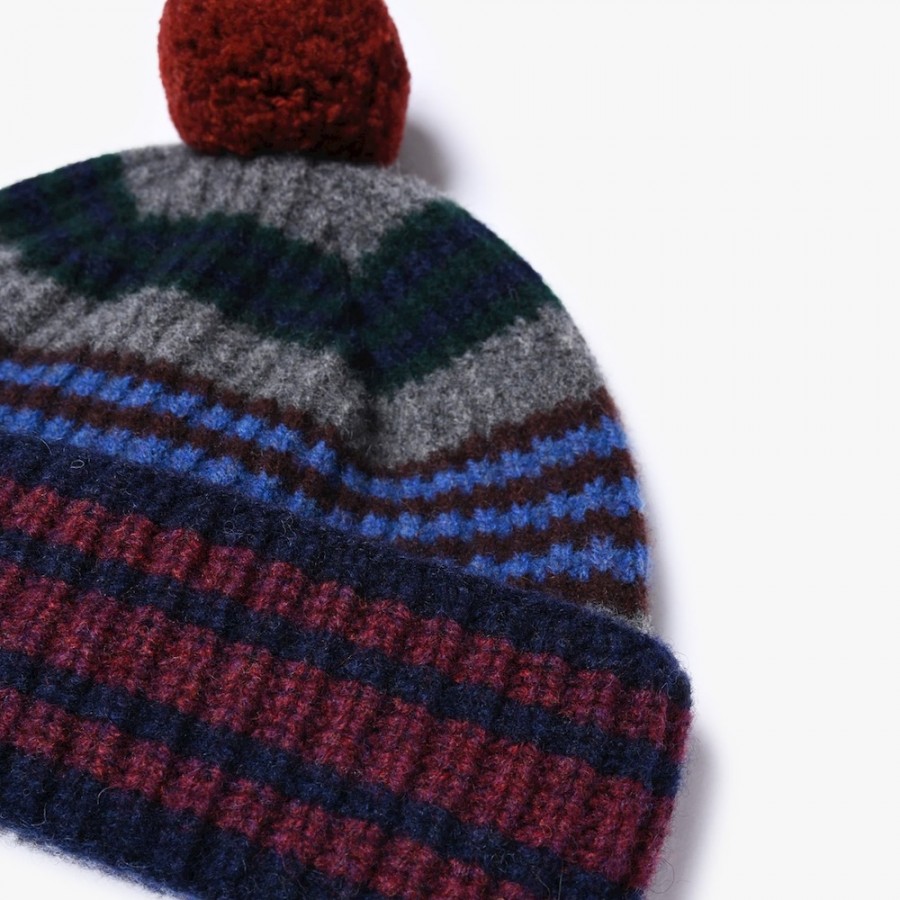 Slow Hat, bunt gestreifte Mütze mit Bommel, in gedeckten Farben vom belgischen Label HOWLIN aus reiner Schurwolle